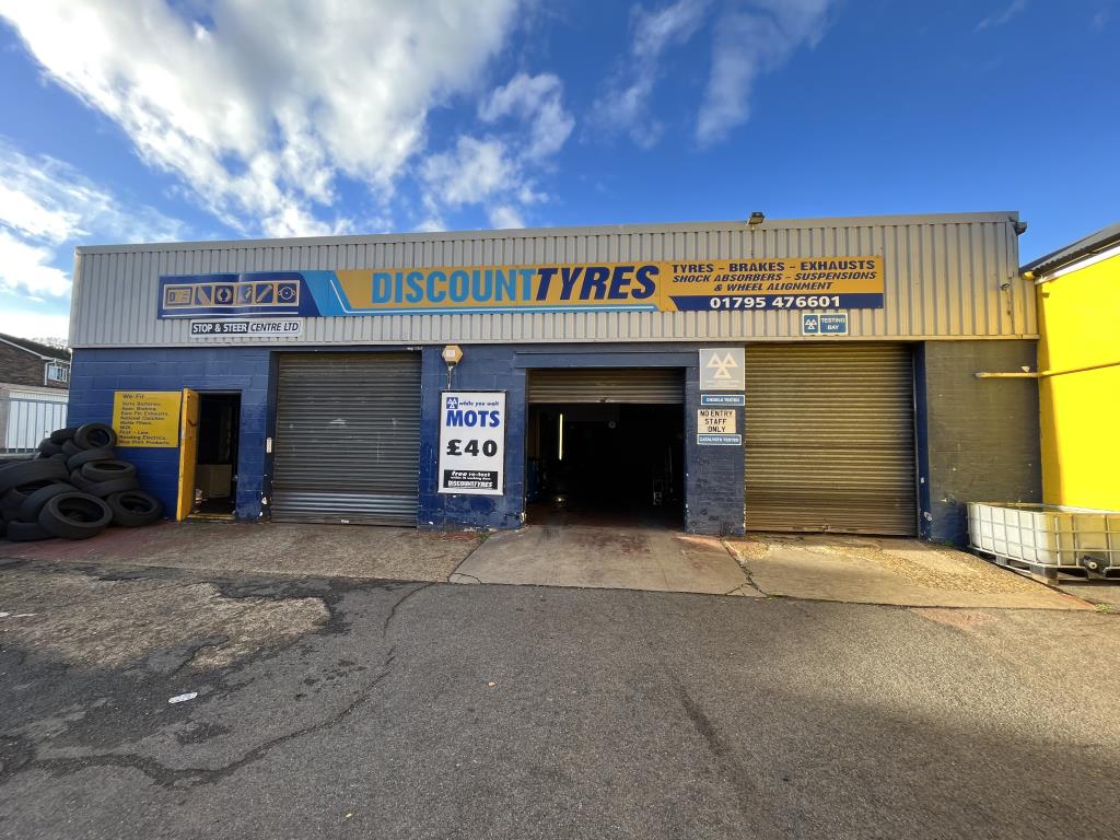 Lot: 58 - FREEHOLD CAR GARAGE/MOT CENTRE - Workshop with roller shutter doors